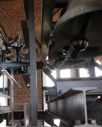 Large Bells and Clappers Attached to a Metal Frame